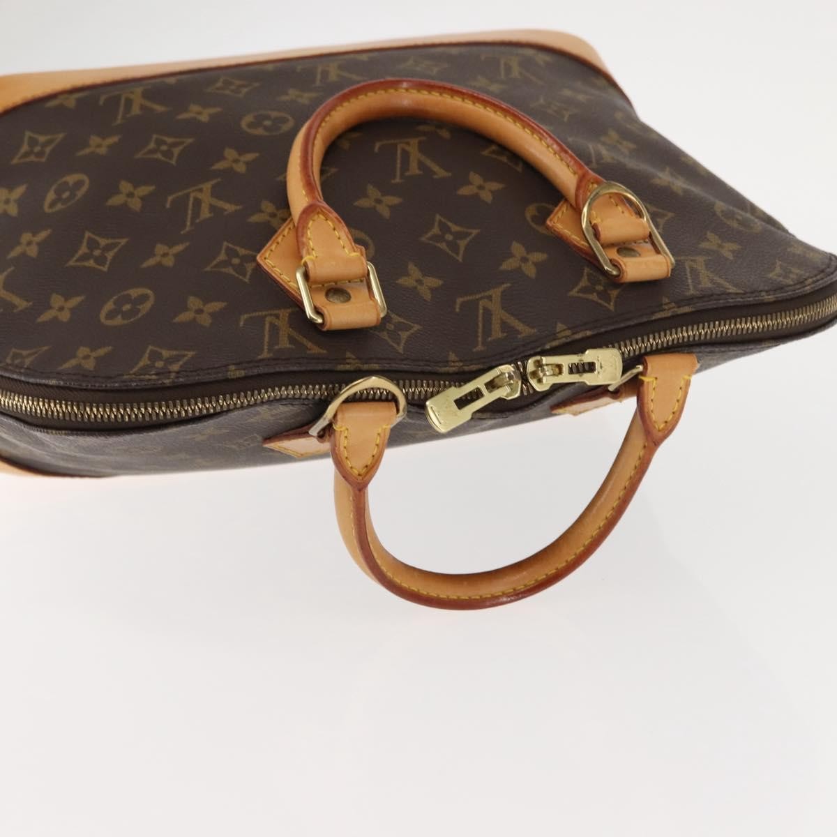Louis Vuitton Alma Handbag Monogram Canvas Brown Canvas Handbag