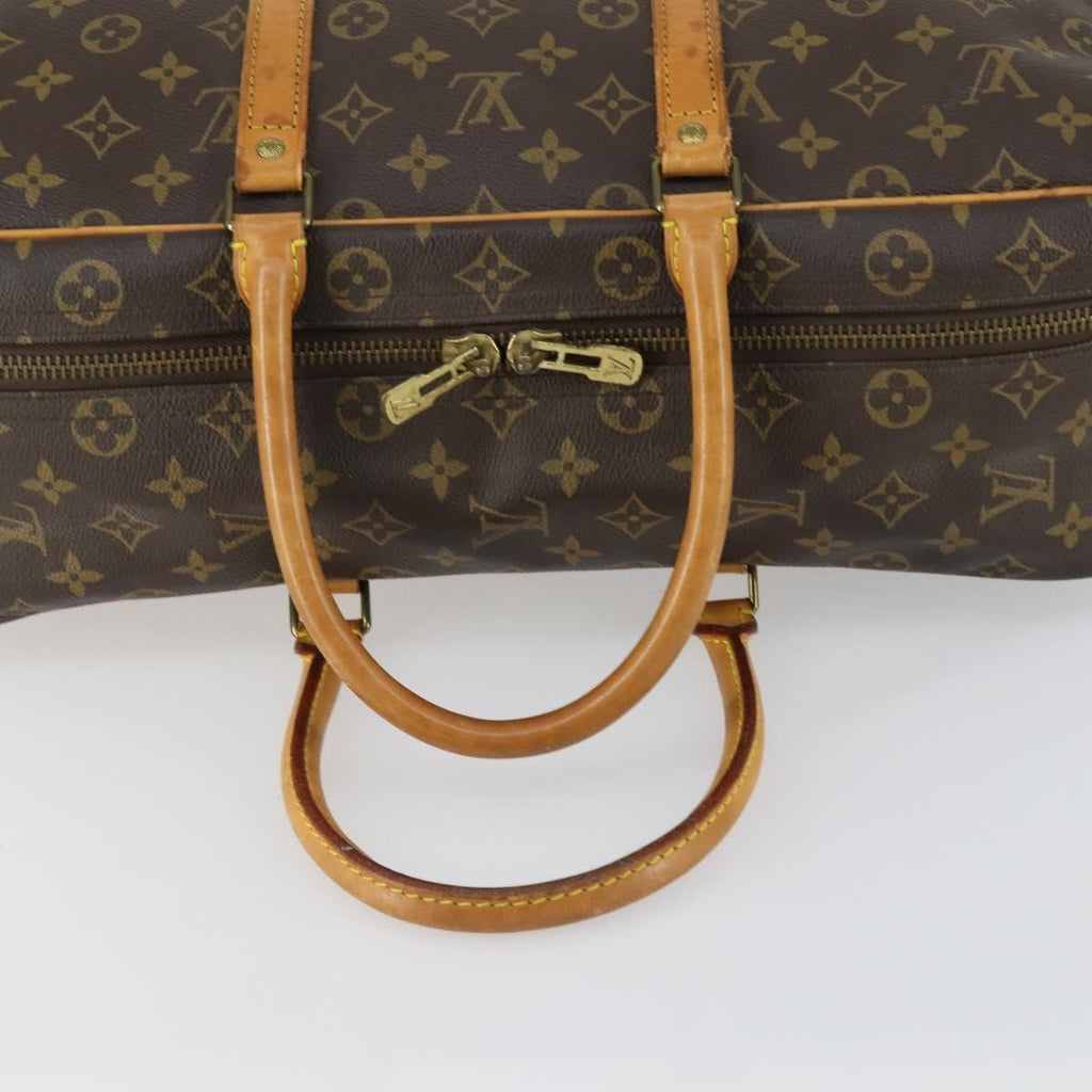 Louis Vuitton Sirius Handbag Monogram Canvas Brown Canvas Travel Bag