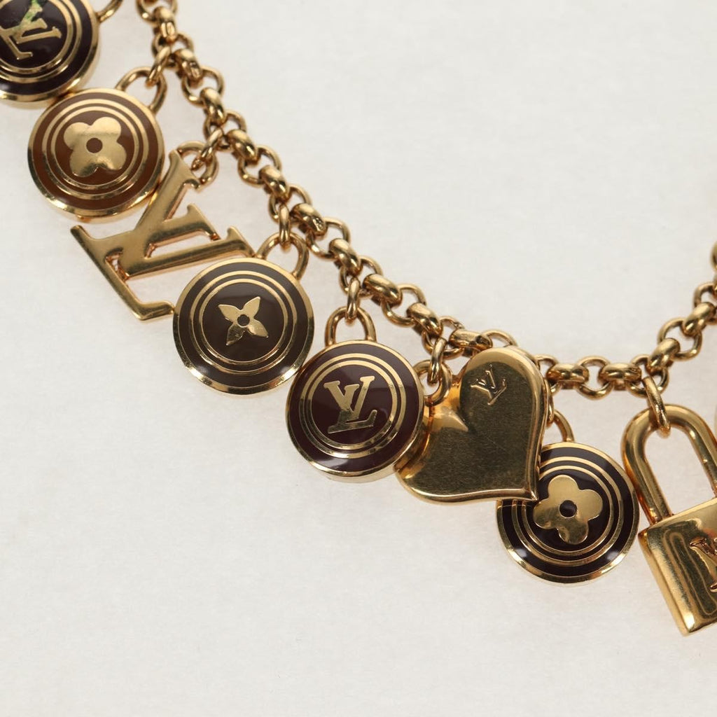 Louis Vuitton Pastilles Bag Charm And Key Holder Metal And Enamel Gold Metal Charms And Keychains Accessory