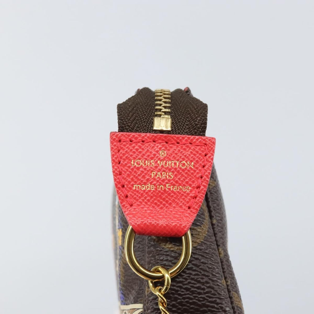 Louis Vuitton Pochette Accessoires Limited Edition Vivienne Xmas Monogram Canvas Brown Canvas Clutche & Pouche Bag
