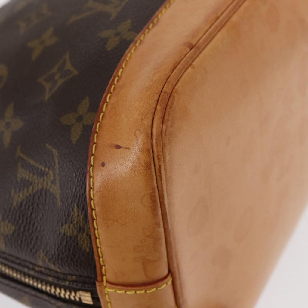 Louis Vuitton Alma Handbag Monogram Canvas Brown Canvas Handbag