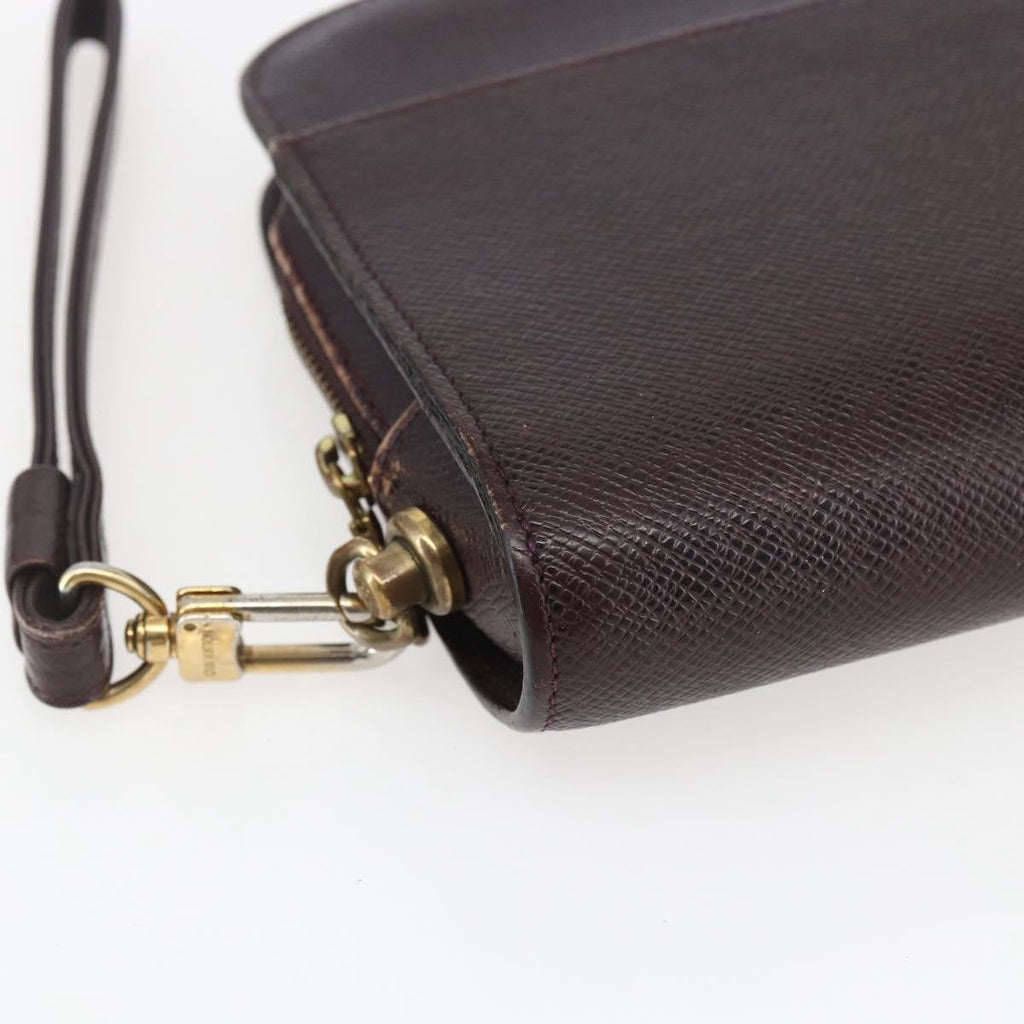 Louis Vuitton Pochette Baikal Clutch Taiga Leather Burgundy Leather Clutche & Pouche Bag
