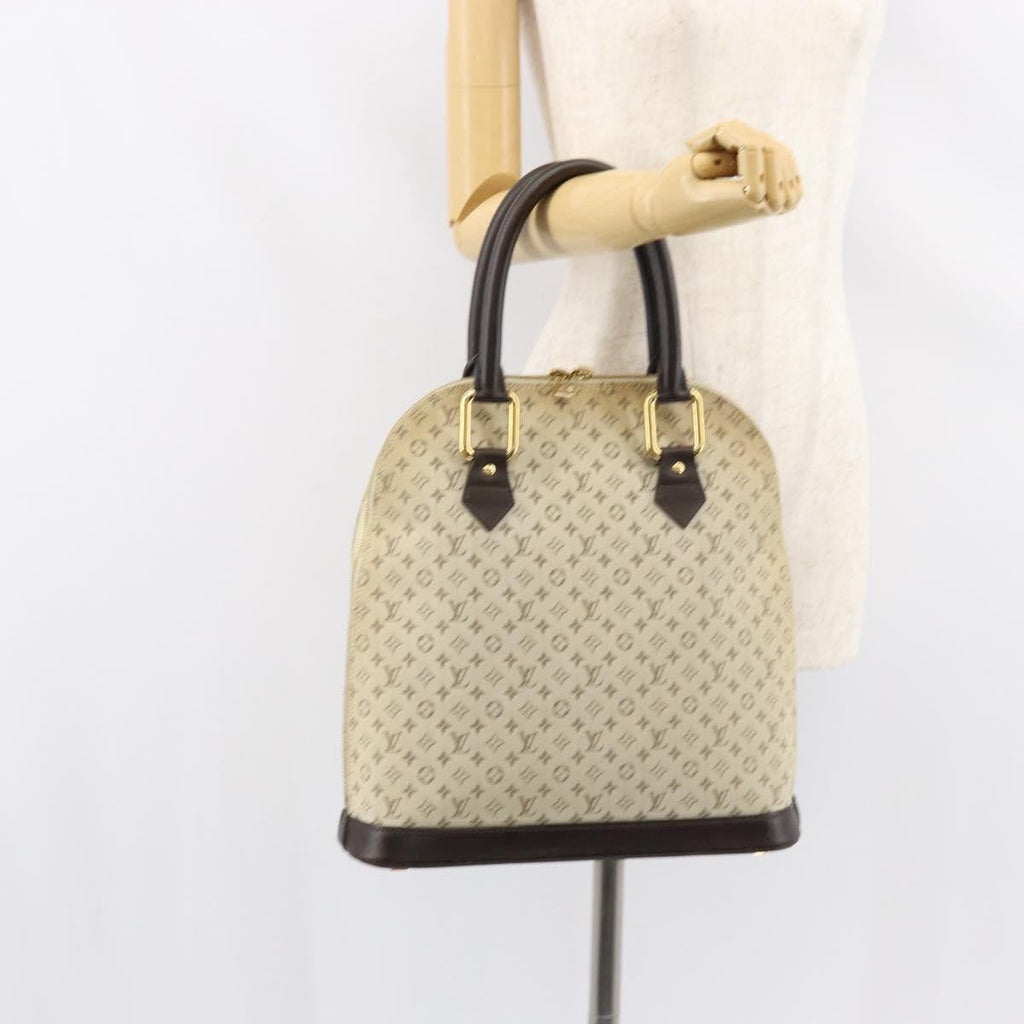 Louis Vuitton Alma Handbag Mini Lin Monogram Khaki Canvas Handbag