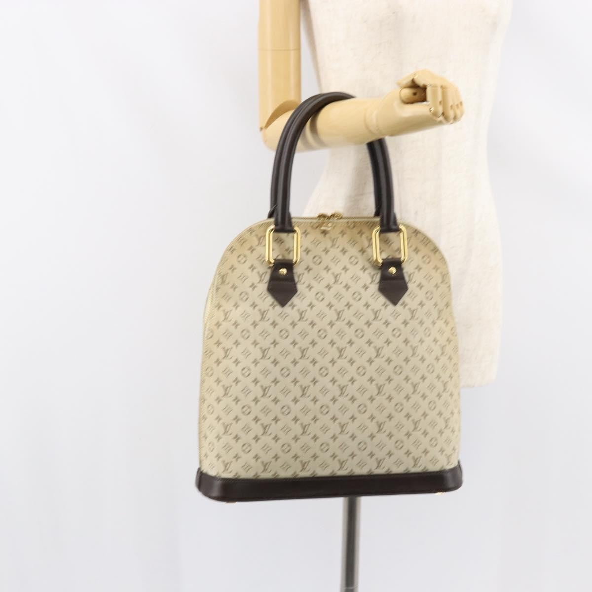 Louis Vuitton Alma Handbag Mini Lin Monogram Khaki Canvas Handbag