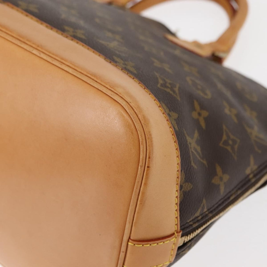 Louis Vuitton Alma Handbag Monogram Canvas Brown Canvas Handbag