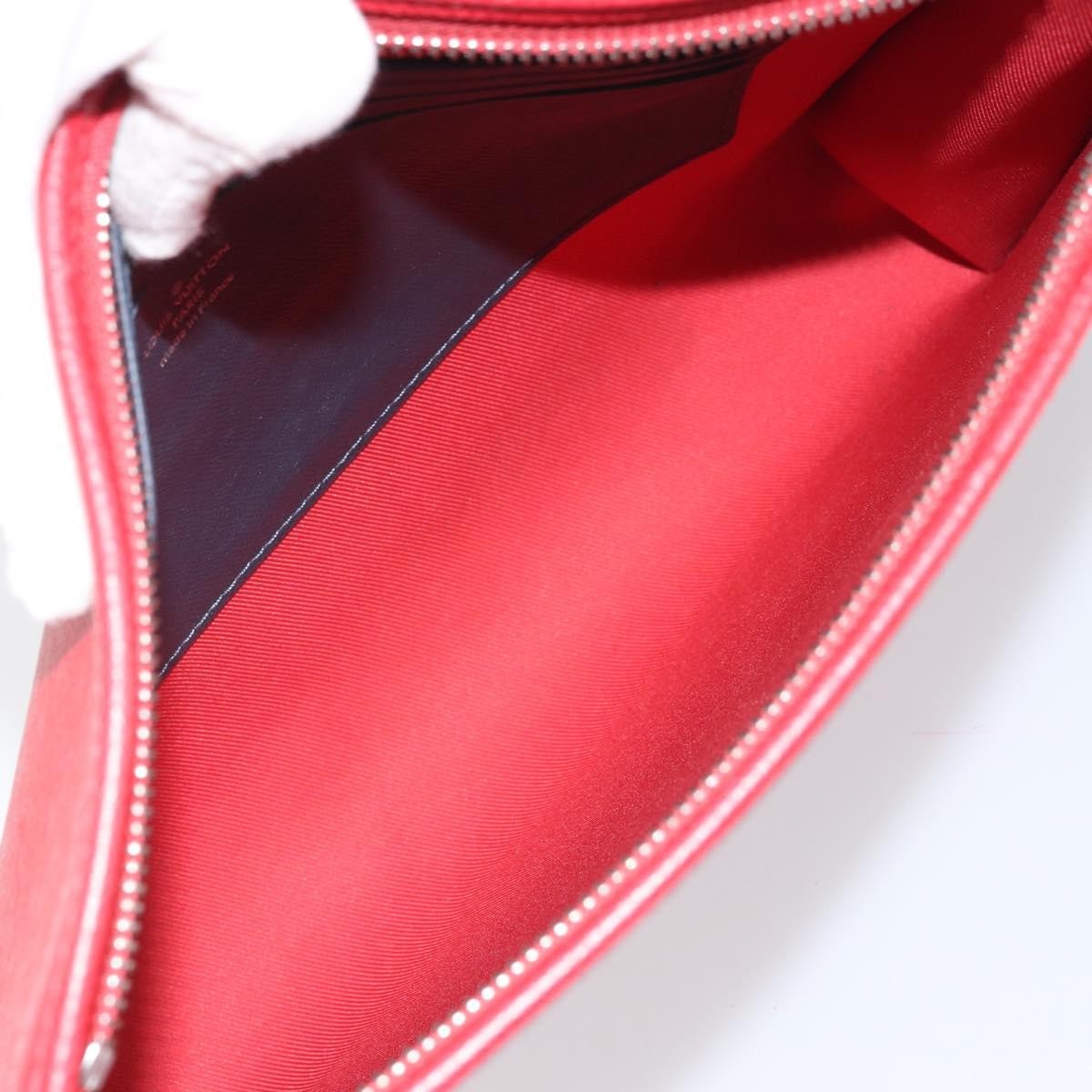 Louis Vuitton Pochette Voyage Taiga Leather Red Leather Clutche & Pouche Bag