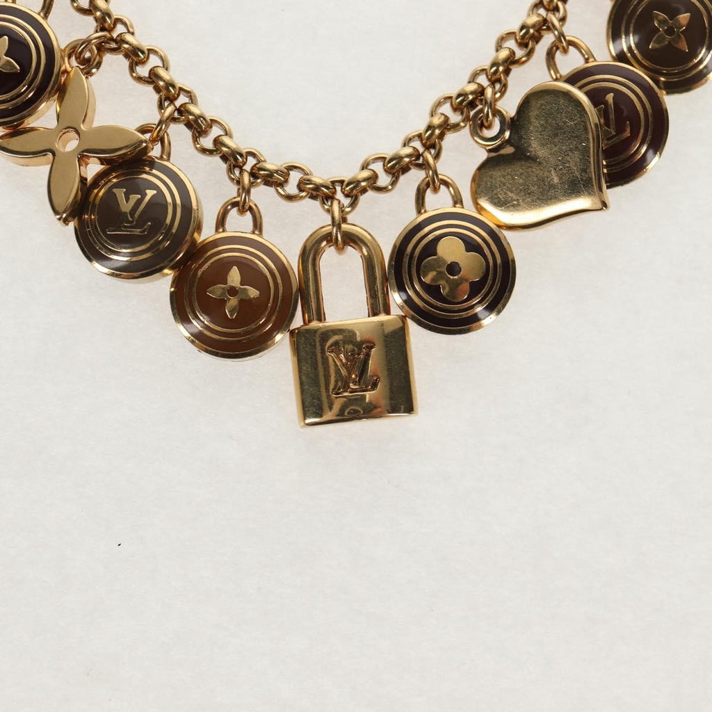 Louis Vuitton Pastilles Bag Charm And Key Holder Metal And Enamel Gold Metal Charms And Keychains Accessory