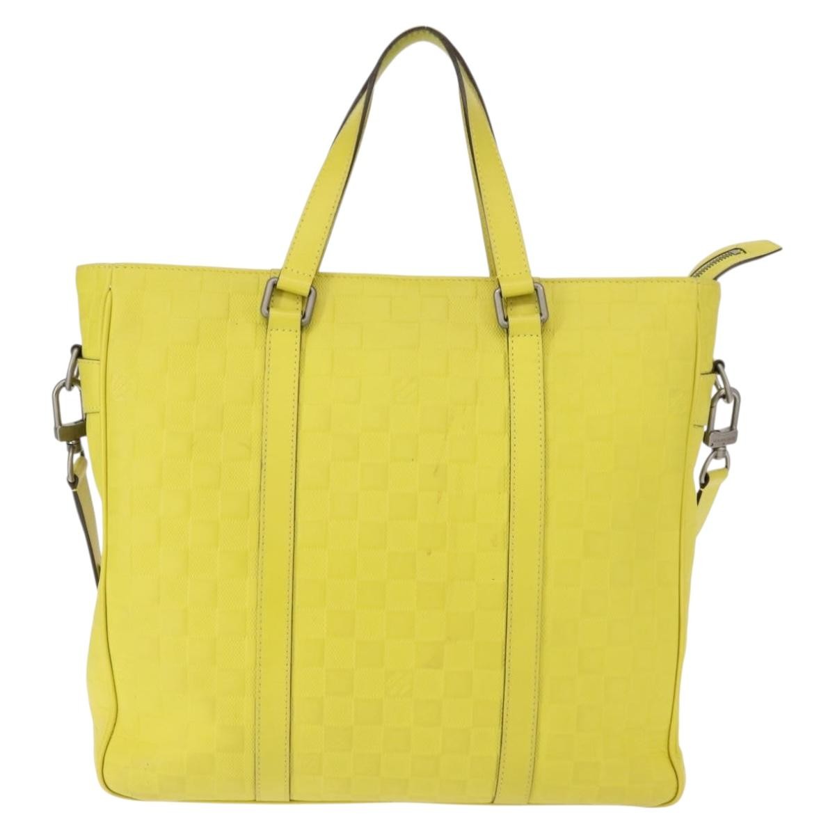 Louis Vuitton Tadao Handbag Damier Infini Leather Yellow Leather Handbag