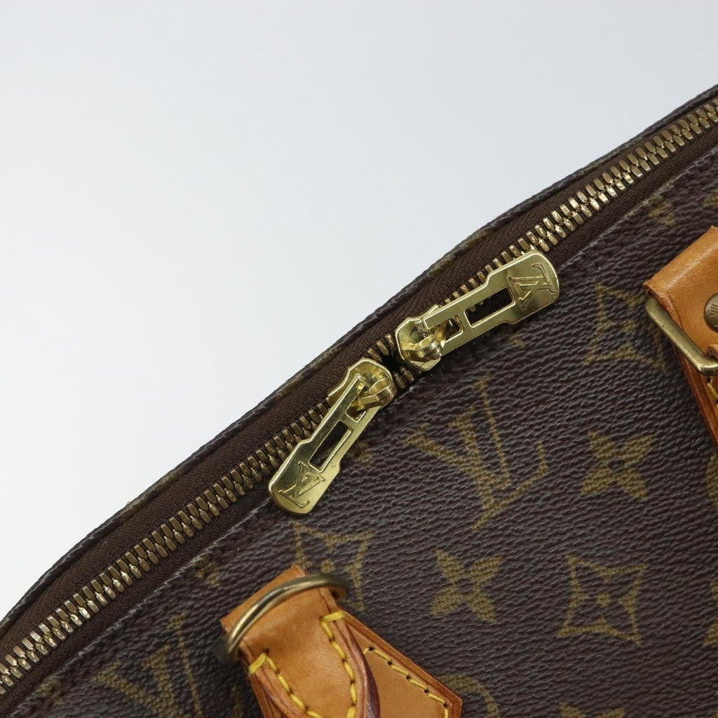 Louis Vuitton Alma Handbag Monogram Canvas Brown Canvas Handbag