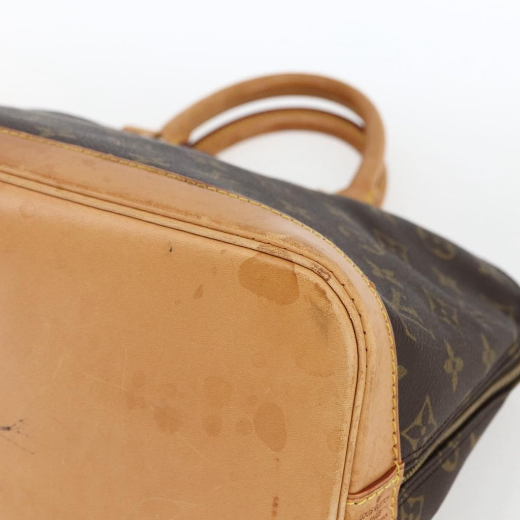 Louis Vuitton Alma Handbag Monogram Canvas Brown Canvas Handbag