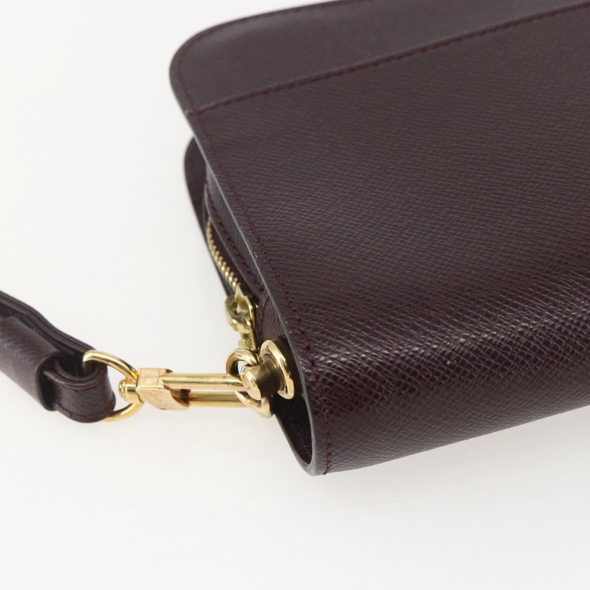 Louis Vuitton Pochette Baikal Clutch Taiga Leather Brown Leather Clutche & Pouche Bag