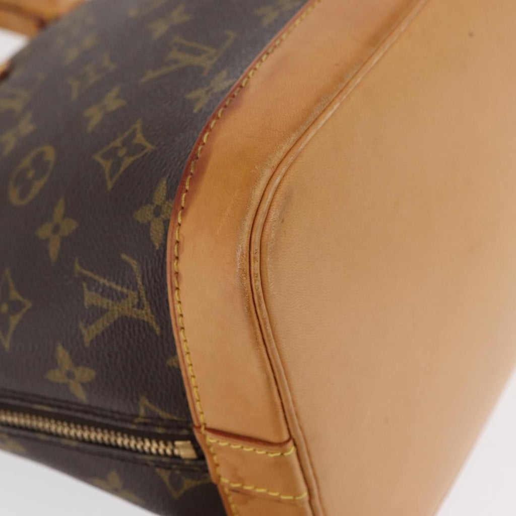 Louis Vuitton Alma Handbag Monogram Canvas Brown Canvas Handbag