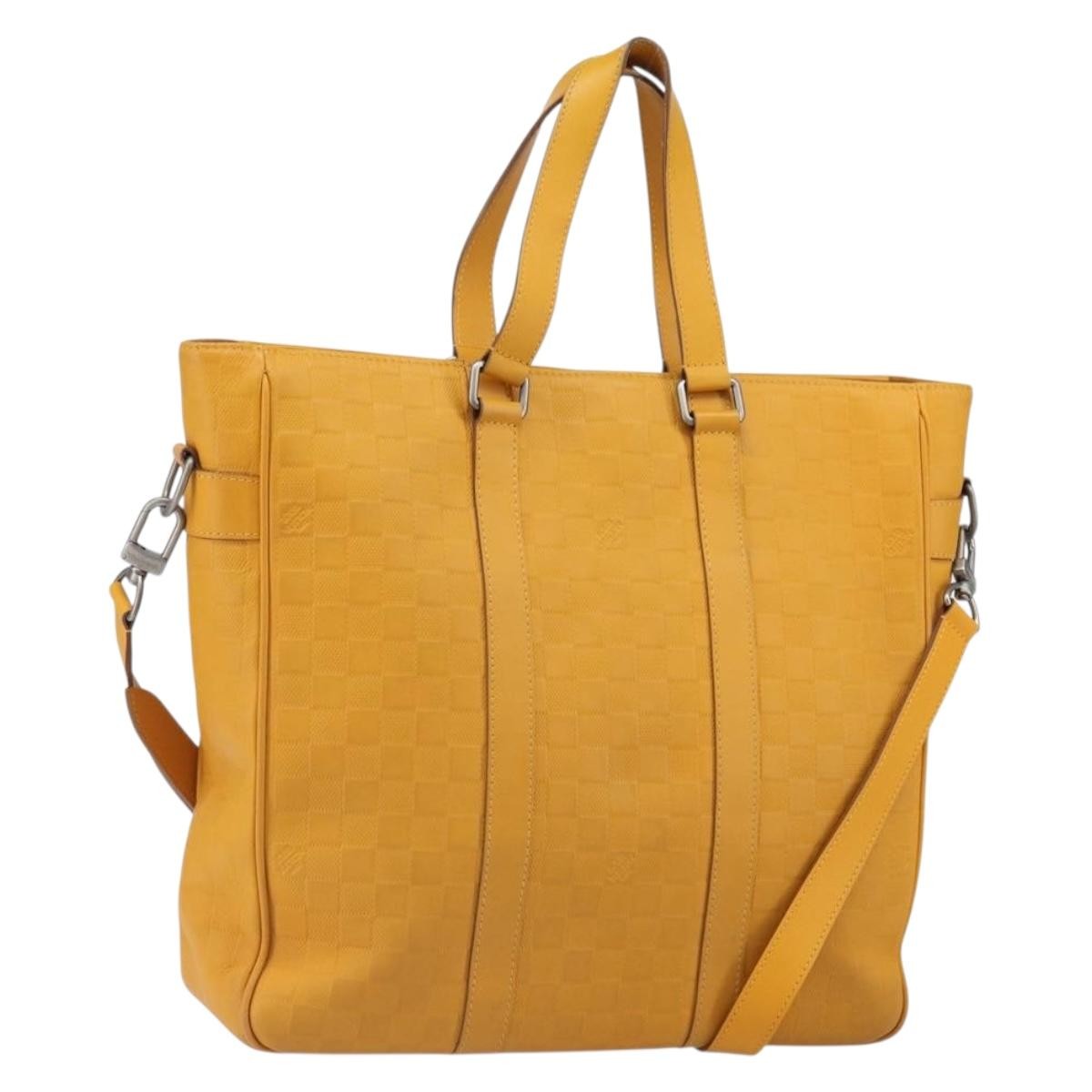 Louis Vuitton Tadao Handbag Damier Infini Leather Yellow Leather Handbag