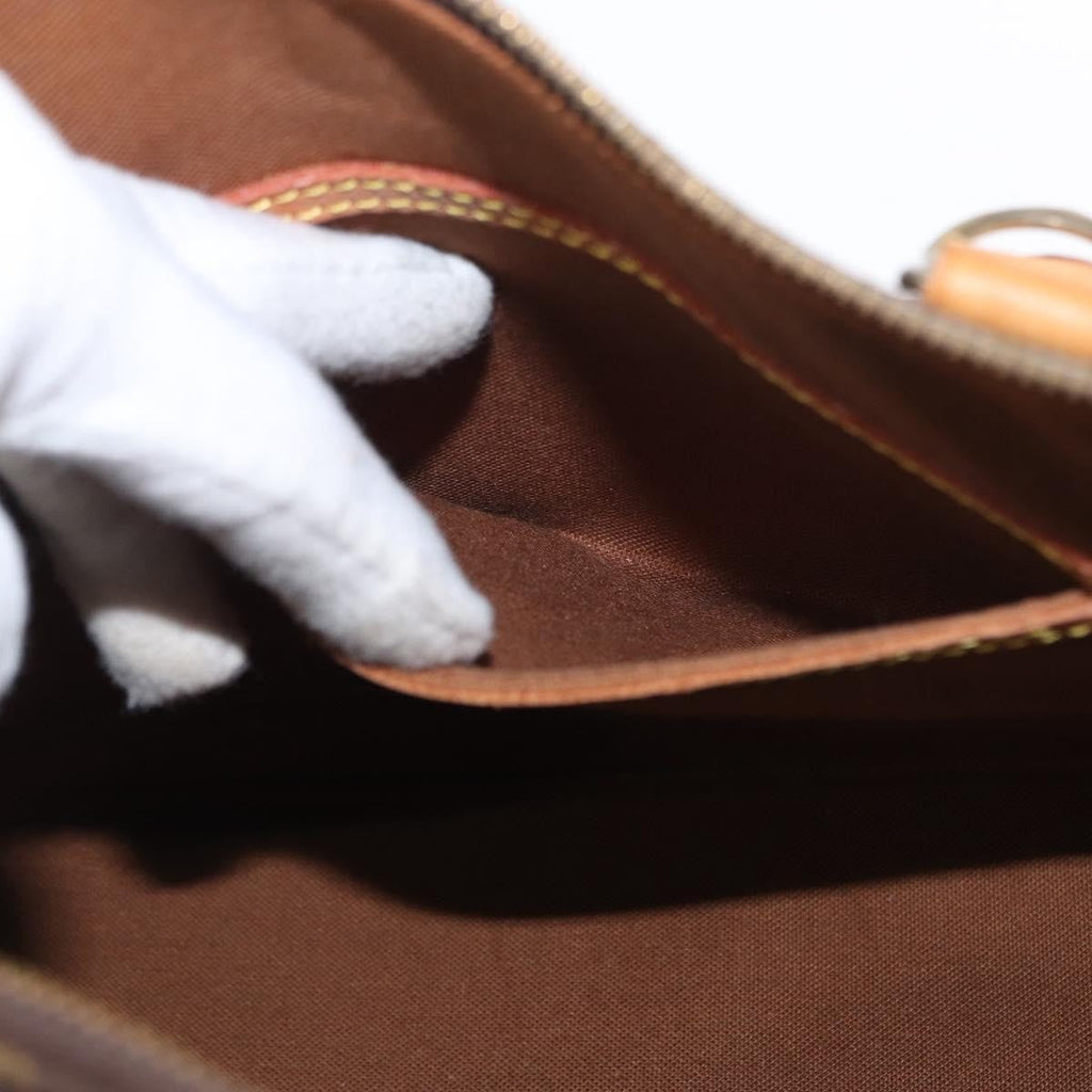 Louis Vuitton Alma Handbag Monogram Canvas Brown Canvas Handbag