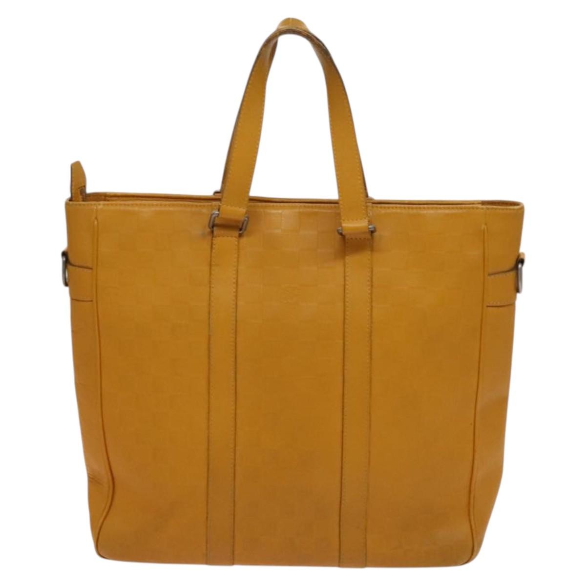 Louis Vuitton Tadao Handbag Damier Infini Leather Yellow Leather Handbag