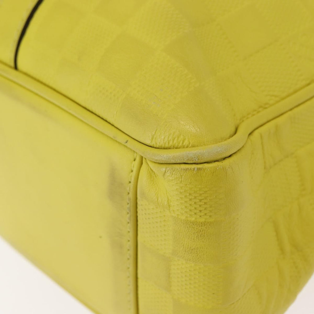 Louis Vuitton Tadao Handbag Damier Infini Leather Yellow Leather Handbag