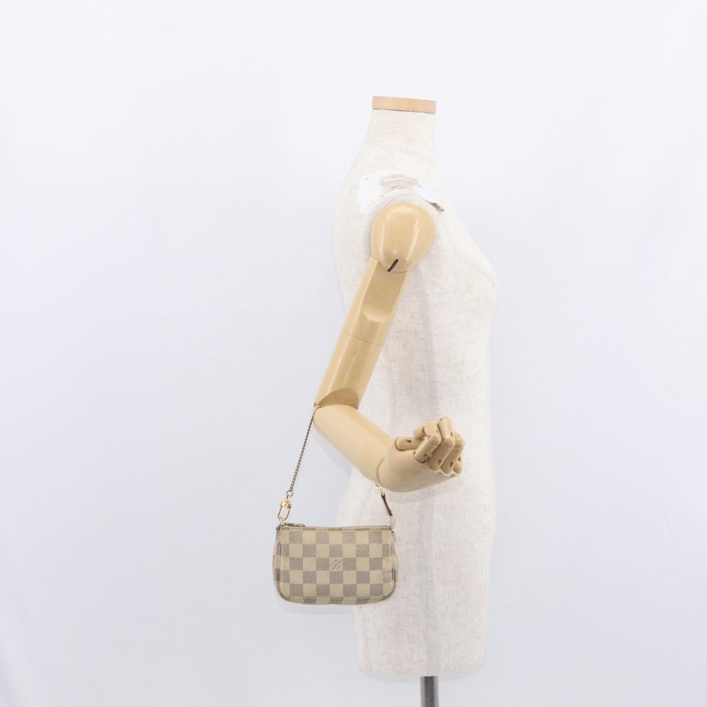 Louis Vuitton Mini Pochette Accessoires Damier Canvas White Canvas Clutche & Pouche Bag