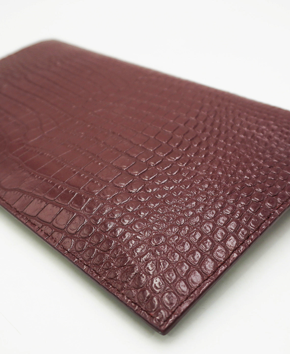 Embossed Monogram Uptown Envelope Pouch Red