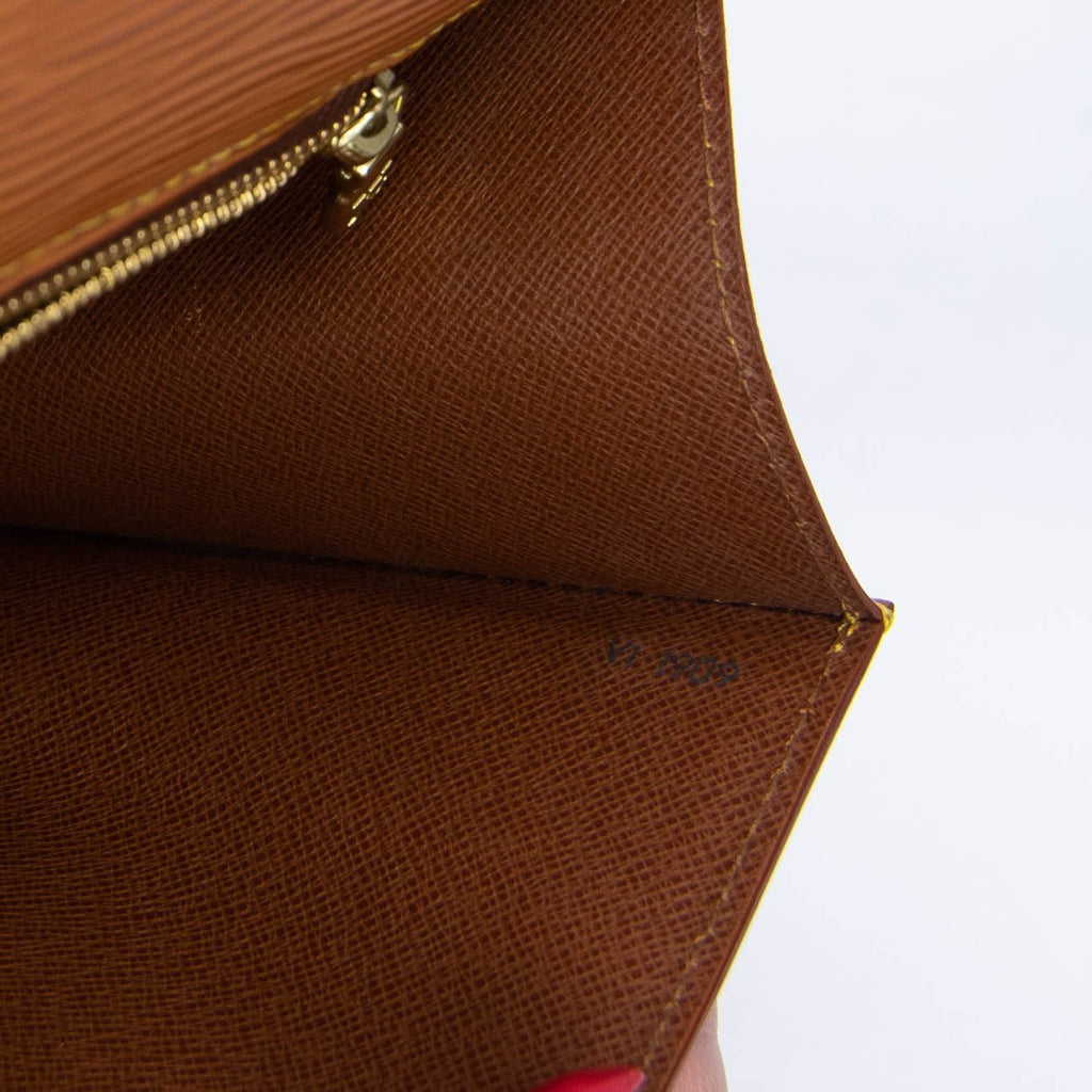 Epi Sellier Dragonne Clutch Brown  M52618
